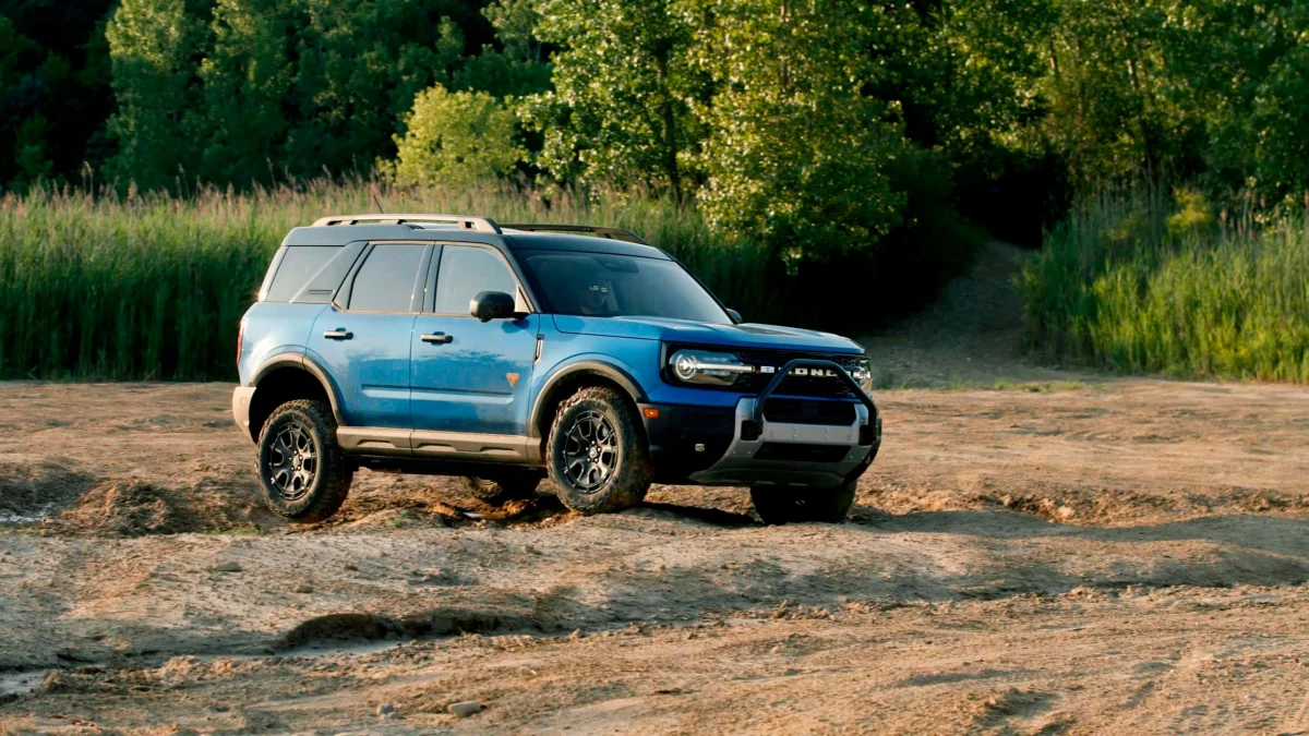 2025 Ford Bronco Sport Sasquatch exterior front three quarter going over lumpy mud